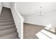 Bright living room featuring a staircase, a chandelier, and a hardwood floor at 367 Sequoia Dr, Lake Wales, FL 33859