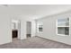 Neutral bedroom with plush carpet, bright windows and an ensuite bathroom at 375 Sequoia Dr, Lake Wales, FL 33859