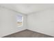 Cozy bedroom with plush carpet and a window with lots of natural light at 375 Sequoia Dr, Lake Wales, FL 33859