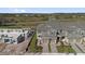 Aerial view of townhomes, some under construction, with lush landscaping at 410 Sequoia Dr, Lake Wales, FL 33859