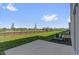Backyard view showing the serene water view and green lawn at 410 Sequoia Dr, Lake Wales, FL 33859