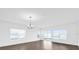 Bright, open living area with large windows and sliding glass door that lead to outdoor living at 410 Sequoia Dr, Lake Wales, FL 33859