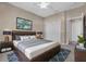 Comfortable bedroom featuring a TV and a view to the hallway at 4112 Aberdeen Ln, Lake Wales, FL 33859