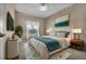 Cozy bedroom with ample natural light, complemented by a decorative rug, and modern furnishings at 4112 Aberdeen Ln, Lake Wales, FL 33859