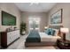 Comfortable primary bedroom featuring a fluffy rug, a window, and natural light at 4112 Aberdeen Ln, Lake Wales, FL 33859