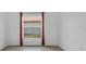 Empty bedroom with wood floors and natural light at 4112 Aberdeen Ln, Lake Wales, FL 33859