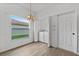Dining room with table, chairs, and built-in laundry at 4112 Aberdeen Ln, Lake Wales, FL 33859