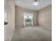 A clean empty bedroom with neutral walls and carpets at 4112 Aberdeen Ln, Lake Wales, FL 33859