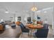 Inviting living space with an open floor plan, modern furnishings, and a connected dining area at 4112 Aberdeen Ln, Lake Wales, FL 33859