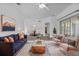 Cozy living room showcasing contemporary decor, including a plush sofa and stylish accents at 4112 Aberdeen Ln, Lake Wales, FL 33859