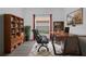 Office with large desk, shelves, and natural light at 4112 Aberdeen Ln, Lake Wales, FL 33859