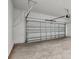 Spacious garage with concrete floor and white walls at 5714 Cattle Ranch Dr, St Cloud, FL 34771