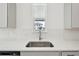 Kitchen sink featuring faucet and an exterior window for outdoor views and natural light at 5714 Cattle Ranch Dr, St Cloud, FL 34771
