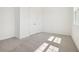 Bedroom with carpeted floor and a closet with double doors at 5715 Cattle Ranch Dr, St Cloud, FL 34771