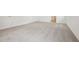 Spacious carpeted bedroom offers a clean, neutral palette ready for personal touches at 5715 Cattle Ranch Dr, St Cloud, FL 34771