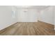 Open dining area with hardwood flooring and elegant lighting at 5715 Cattle Ranch Dr, St Cloud, FL 34771
