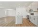 Open concept, bright kitchen with stainless steel appliances and an island at 5715 Cattle Ranch Dr, St Cloud, FL 34771