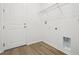 Laundry room features durable flooring and includes connections for washer/dryer hookups at 5715 Cattle Ranch Dr, St Cloud, FL 34771