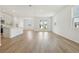 Bright open space with recessed lighting, hard surface floors, leading to double glass doors at 5715 Cattle Ranch Dr, St Cloud, FL 34771