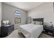 Bedroom with large window and plenty of space for furniture at 8167 Roseville Rd, Davenport, FL 33896