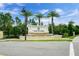 The Fountains community entrance with a water feature and landscaping at 8167 Roseville Rd, Davenport, FL 33896