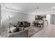 Open living area with comfortable seating and dining space at 8167 Roseville Rd, Davenport, FL 33896