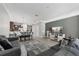 Open living room with dining area and modern decor at 8167 Roseville Rd, Davenport, FL 33896
