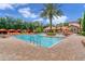 Resort-style pool with lounge chairs, cabanas, and a large deck area at 8167 Roseville Rd, Davenport, FL 33896
