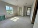 Bright bedroom featuring a large window and neutral walls, ready for your personal touch at 1309 Errol Green Ct, Apopka, FL 32712