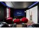 Home theater with large screen, comfortable seating, and Disney+ at 1429 Moon Valley Dr, Champions Gate, FL 33896