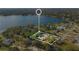 An aerial view of the property's location near a beautiful lake and surrounded by trees at 7200 Grace Rd, Orlando, FL 32819