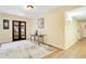 Bright dining room with hardwood floors and glass table, perfect for entertaining guests at 7200 Grace Rd, Orlando, FL 32819