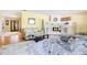 Spacious living room showcasing a fireplace, wooden floors, a comfortable seating area, and a connection to the dining area at 7200 Grace Rd, Orlando, FL 32819