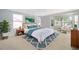 This main bedroom offers lots of natural light and a soft color palette at 11313 Via Andiamo, Windermere, FL 34786