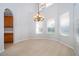 View of formal dining area with chandelier and lots of natural light at 11313 Via Andiamo, Windermere, FL 34786