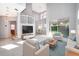 Bright living room with high ceilings and lots of natural light with view to dining room and backyard at 11313 Via Andiamo, Windermere, FL 34786