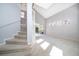 A bright living room featuring soaring ceilings, lots of natural light and access to the backyard at 11313 Via Andiamo, Windermere, FL 34786