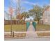 Entrance to a neighborhood park with signs and walking path at 3563 S Saint Lucie Dr, Casselberry, FL 32707
