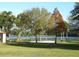 Sand volleyball court near a lake with trees in the background at 3563 S Saint Lucie Dr, Casselberry, FL 32707