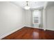 Bright dining room with hardwood floors and window at 555 Carey Way, Orlando, FL 32825