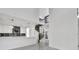 Bright living room with a modern spiral staircase and elegant finishes at 1315 Wheeler Rd, Apopka, FL 32703