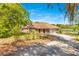 Charming single-story home with attached garage and picturesque lake view at 45 Sackett Rd, Debary, FL 32713