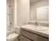 Clean bathroom with vanity, toilet and shower at 791 Chinoy Rd, Davenport, FL 33837