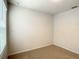 Well-lit bedroom with neutral walls and carpet at 791 Chinoy Rd, Davenport, FL 33837