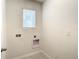 Bright laundry room with washer and dryer hookups at 791 Chinoy Rd, Davenport, FL 33837