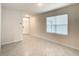 Bright and spacious living room with neutral color scheme and tile floors at 791 Chinoy Rd, Davenport, FL 33837