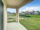 Covered patio with view of backyard and surrounding area at 791 Chinoy Rd, Davenport, FL 33837