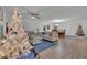 Bright and open living space with a view into the dining room, perfect for Gathering gatherings at 2325 Crossandra St, Mascotte, FL 34753