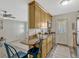 Kitchen featuring wooden cabinetry, a breakfast bar, and stainless steel appliances at 320 Lakeview St # 123, Orlando, FL 32804