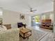 Living room with wood flooring and a front door view at 320 Lakeview St # 123, Orlando, FL 32804
